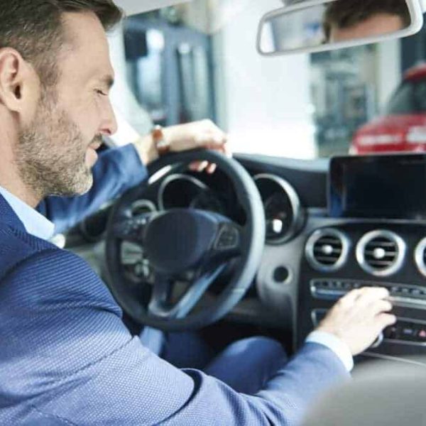 handsome-customer-checking-the-car-interior-e1631573837115.jpg